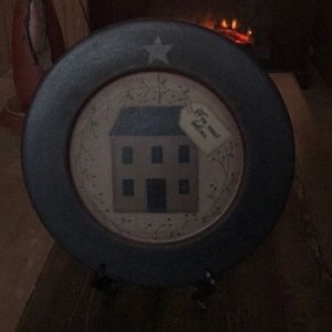 Black wooden primitive plate with stand